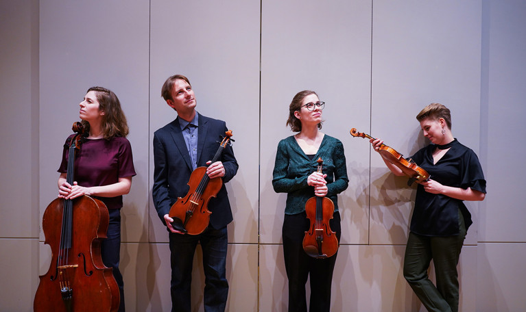 Four musicians. Photo.