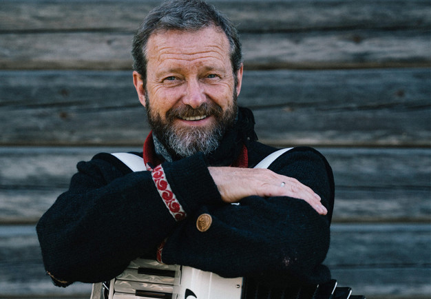 Man med dragspel. Fotografi